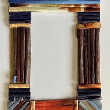 Frame using rolled magazine paper on cardboard