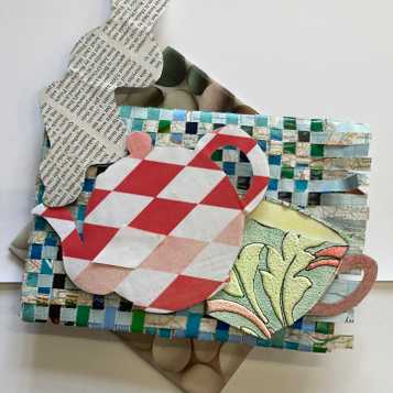 Relief using magazine paper, wallpaper and pages from a map