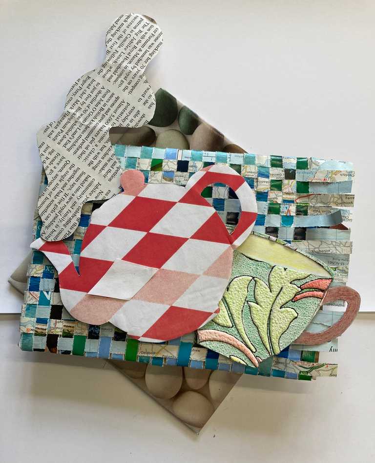 Relief using magazine paper, wallpaper and pages from a map
