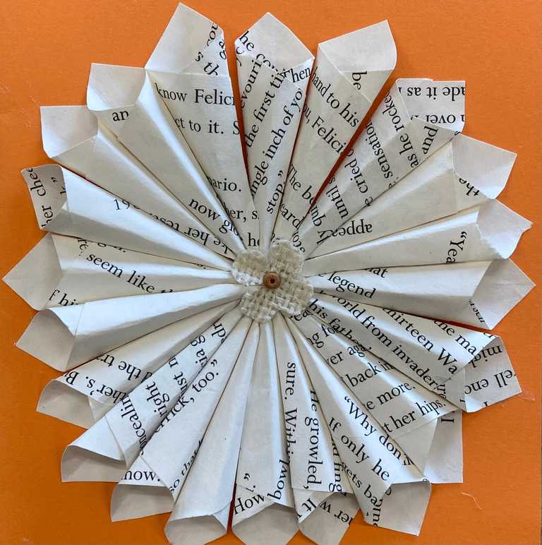 Relief flower using book paper