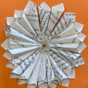 Relief flower using book paper