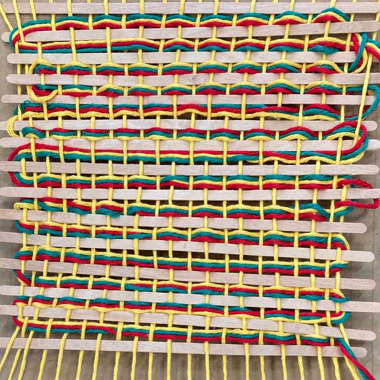 Wooden stirrers and wool weaving