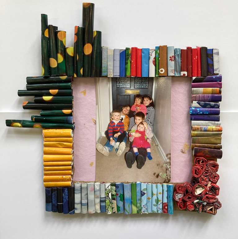 Rolled magazine frame
