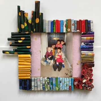 Rolled magazine frame